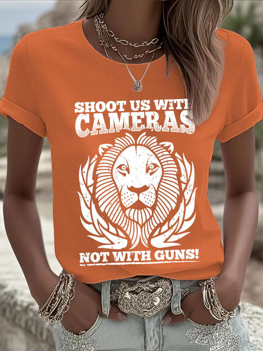Women's 'Shoot us with cameras, not with guns' T-shirts